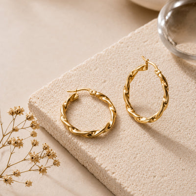 küpeler