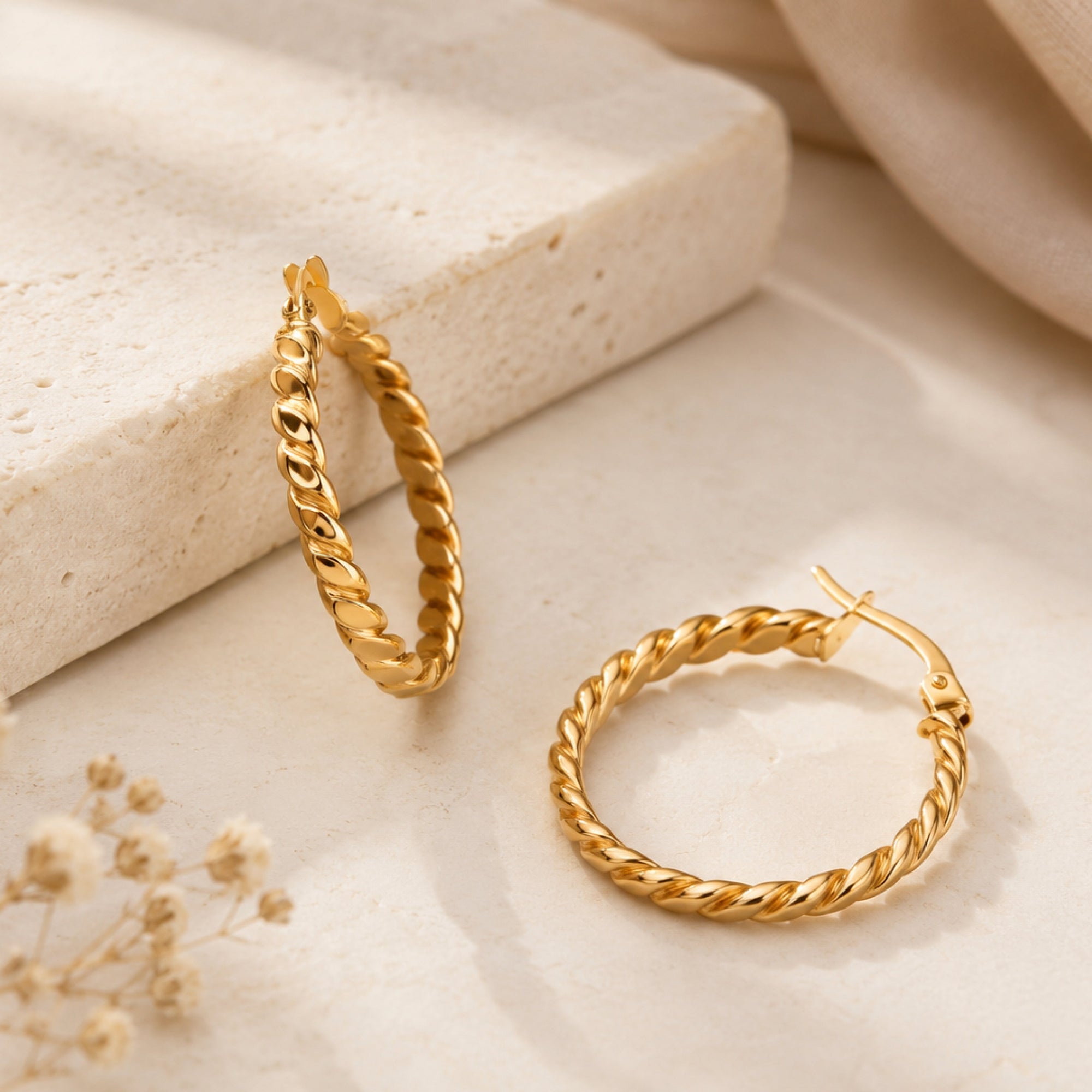 küpeler